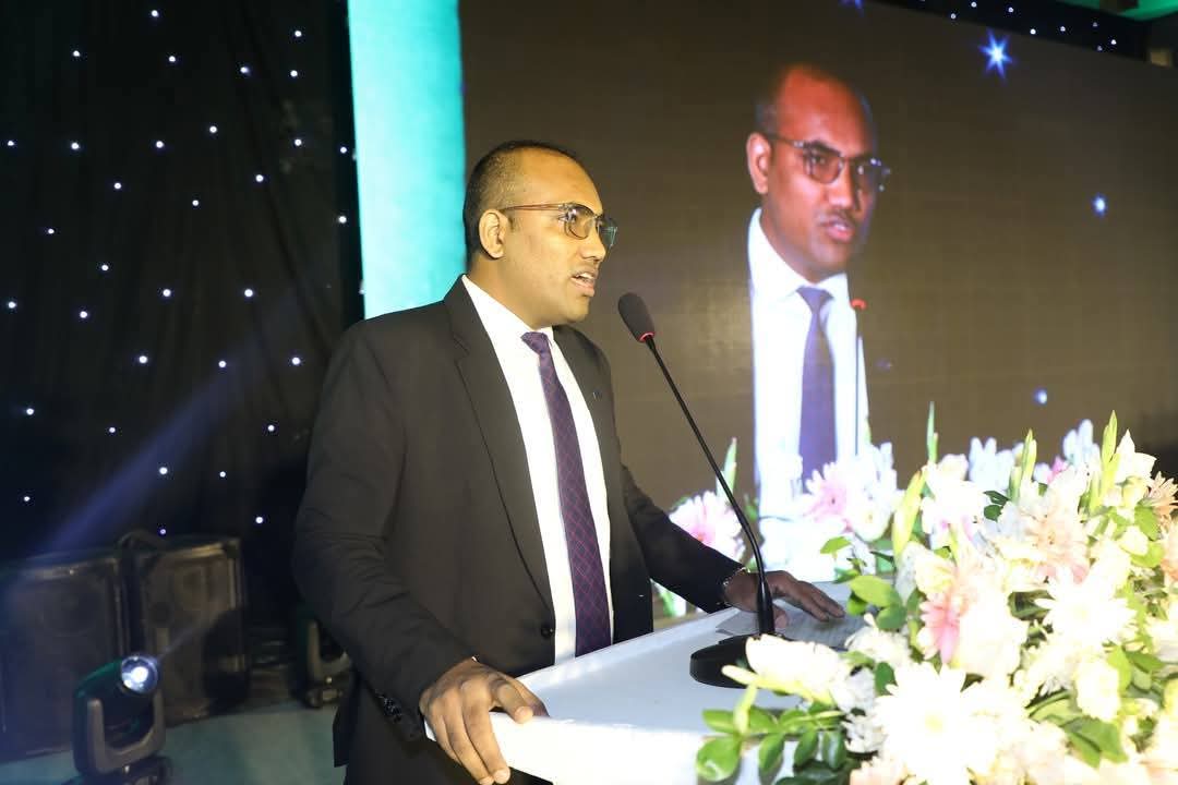 Executive leadership keynote address in modern auditorium